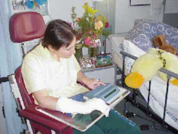 A patient using a communication device